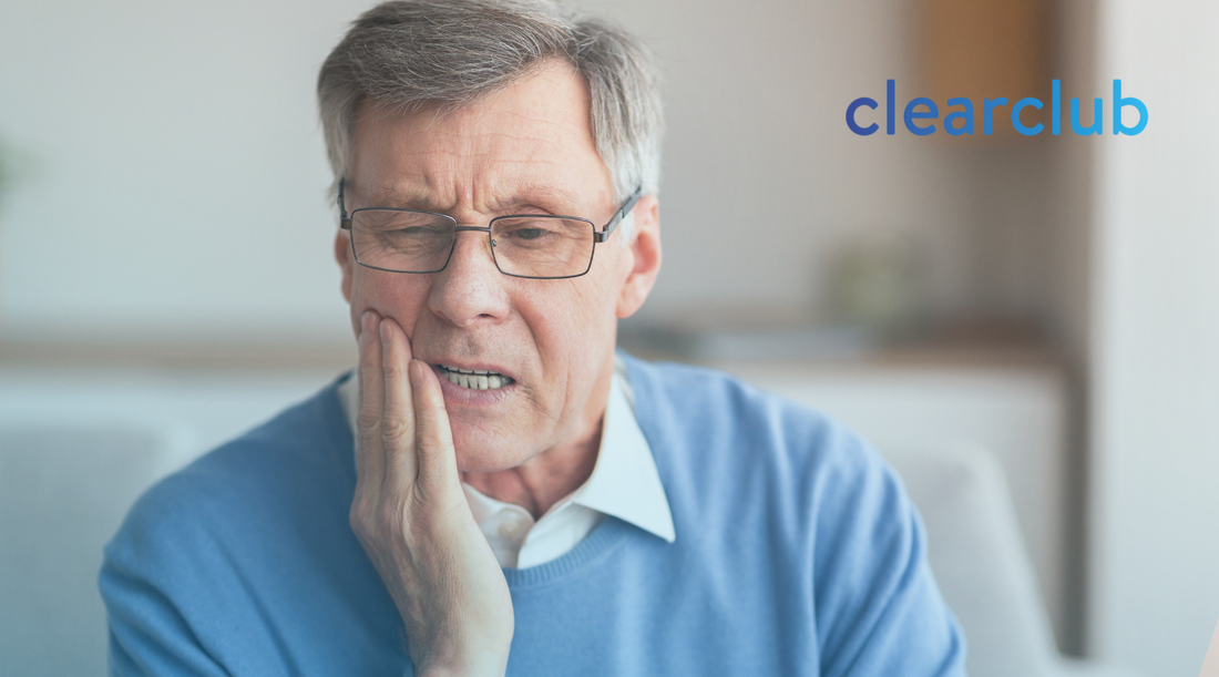 Man suffering from clenching jaw pain