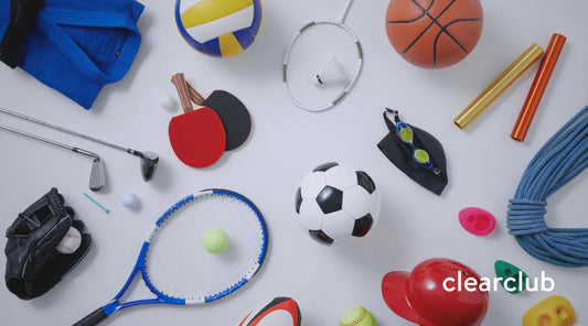 Top-down view of sports equipment used in high-impact activities like soccer, basketball, volleyball, and judo—sports where wearing a mouthguard can help prevent dental injuries.