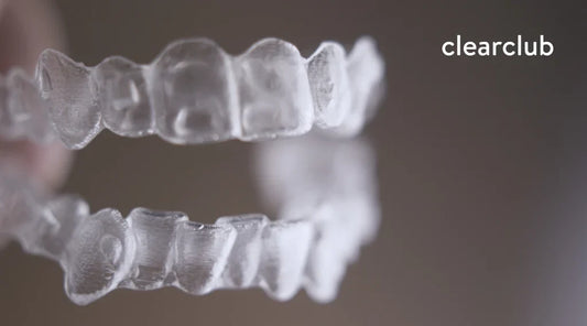 Two clear custom night guards for upper and lower teeth, illustrating the difference between upper and lower night guards.