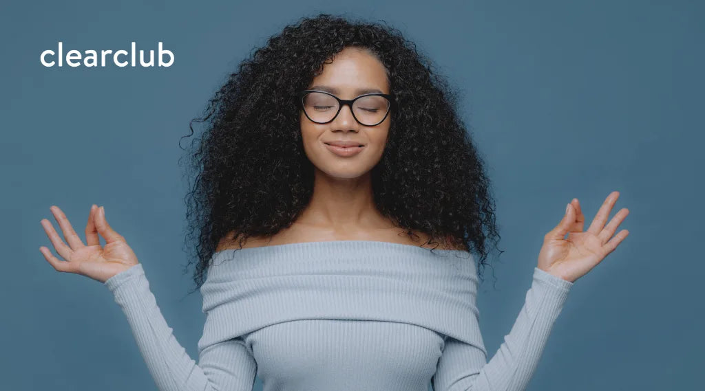 Woman radiating stress-free vibes, illustrating the benefits of managing stress and reducing teeth grinding or jaw clenching.