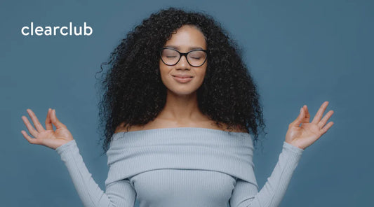 Woman radiating stress-free vibes, illustrating the benefits of managing stress and reducing teeth grinding or jaw clenching.