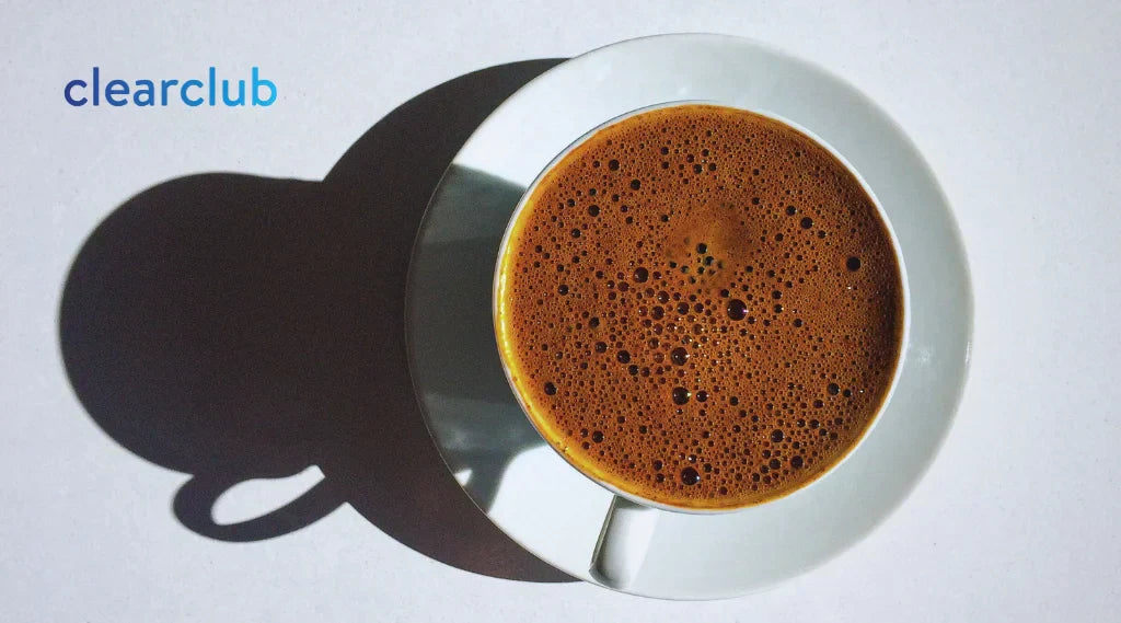 A cup of dark, heavily pigmented coffee, a beverage that can stain teeth.