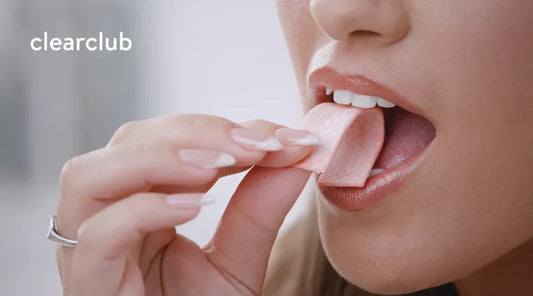 Woman chewing gum, a common habit sometimes linked to jaw strain 