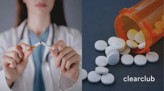 Cigarette and pill bottle placed side by side, symbolizing harmful habits